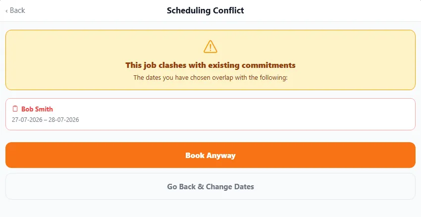 A Scheduling Conflict warning: 'This job clashes with existing commitments — the dates you have chosen overlap with the following', listing an existing booking, with 'Book Anyway' and 'Go Back & Change Dates' buttons.
